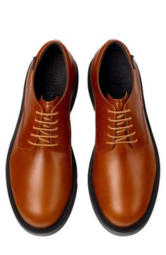 A burnished leather upper and precise stitching give this classic lace-up shoe a polished finish. Lace-up style OrthoLite® footbed Leather upper/recycled-polyester, recycled-cotton, leather and textile lining/synthetic sole Imported Leather Low-top Oxfords For Fall, Leather Oxfords For Derby In Fall, Fall Derby Low-top Lace-up Shoes, Business Low-top Lace-up Shoes For Fall, Business Fall Low-top Lace-up Shoes, Business Lace-up Low-top Shoes For Fall, Leather Lace-up Shoes With Branded Insole For Business Casual, Fall Business Lace-up Shoes With Leather Footbed, Fall Derby Dress Shoes With Rubber Sole