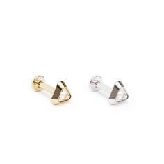 Elevate your cartilage jewelry collection with a minimalist diamond triangle stud earring. Crafted from 14k solid gold, this modern design features a prong-set sparkly diamond totaling 0.015 carats. Chic and comfortable, it's the perfect accessory for adding a touch of sophistication to your everyday style.The threaded screw pin earring post is easy to insert and remove, and the flat back makes it comfortable to wear. Our screw pin flat back earring studs are made of solid 14k gold and are hypoa Modern White Gold Piercings For Gift, Minimalist White Piercings For Anniversary, Modern 14k Gold Piercings As A Gift, Minimalist Anniversary Piercings With Diamond Accents, Minimalist Cartilage Earrings With Diamond Accents, Modern White Gold Cartilage Earrings Gift, Daith Jewelry, Tragus Hoop, Helix Jewelry