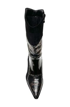 A patchwork of mixed textures and shining studs add a contemporary western-appeal to a pointed toe boot. 3.25" heel 8" shaft height, 11" opening circumference Side zip closure Cushioned footbed Manmade upper and lining, rubber sole Imported Black Western Boots With Rhinestone Rivets, Western Pointed Toe Boots With Rhinestone Rivets, Western Style Leather Knee-high Boots For Party, Fitted Leather Boots With Rhinestone Rivets, Fitted Pointed Toe Boots With Rivets, Fitted Black Boots With Silver Studs, Leather Boots With Rhinestone Rivets And Pointed Toe, Contemporary Western, Embossed Boots