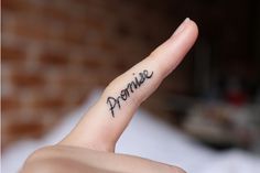 a person's finger with the word bonnie written on it