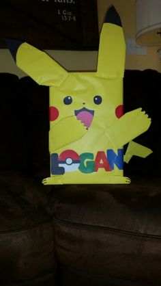 a yellow paper bag with a pikachu on it