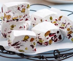 several pieces of cake sitting on top of a plate