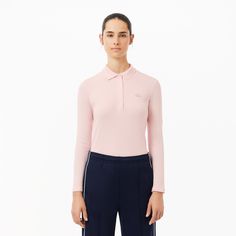 Classic long sleeves and real mother of pearl buttons enhance the feminine look of this season’s active cotton polo shirt. Its slimming fit adds to the charm of this timeless piece.