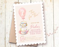 a pink birthday party card with a teacup and hot air balloon on the top