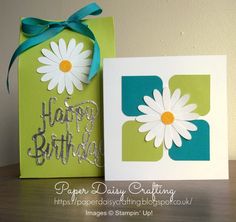 two greeting cards, one with a flower and the other with a happy birthday message