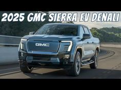 the new gmc sierra suv driving down a road with text overlaying it