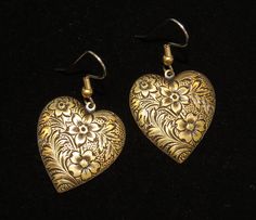 "Hearts Press Stamped with a beautiful Floral like a Tapestry Earrings I call them Tapestry Hearts. Antiqued Brass or Antiqued Oxidized Matte Silver (looks like an Antiqued Pewter). Measures 1\" in diameter. Many more pieces in my store. All my Earrings I make have Surgical Steel Wires or Posts. These are great for the sensitive ears. On the Gold earrings they are 2-toned with the wire being Gray Surgical Steel and the decorative ball and coil being gold. Please see my Etsy Shop for other Unique Tapestry Earrings, Valentine Earrings, Valentines Earrings, Art Nouveau Floral, Love Vintage, Antique Pewter, Sensitive Ears, Jewelry Gift Box, Antique Brass