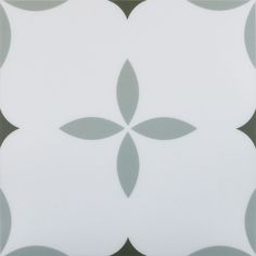 a white and gray tile with an abstract design