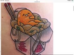 a tattoo with noodles and chopsticks in it