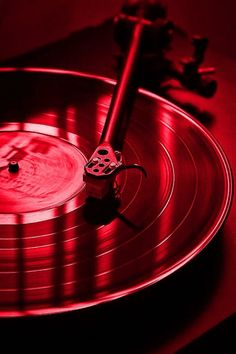 a record player's turntable in red light