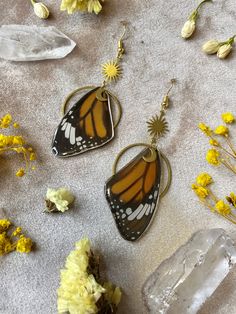 These earrings are made using real Monarch butterfly wings - specifically the top set of wings. This butterfly has many different meanings depending on the culture, but in general, the sighting of this magnificent butterfly signifies that your guardian angel (or guiding spirit) is watching over you. They are regarded as messengers from the spiritual realm since these butterflies are said to be able to travel between our physical and spiritual worlds. Another common meaning for the sighting of a Monarch is that a loved one who has recently passed is trying to send you a message. What a comfort it is to know that we are always being taken care of by our loved ones even after they pass. Wings were coated in resin to ensure longevity Lightweight and durable Assembled using raw brass findings H