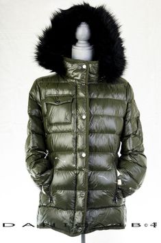 MICHAEL Michael Kors Hooded Quilted Jacket Stand collar; hooded Removable hood Zip pockets at hips Quilted panels, water resistant Fill: polyester Lined 100% nylon; lining:  100% polyester Machine washable Please read before placing a bid. It is your responsibility to ask anything you are unsure of. We are here to assist you. Email us with any questions; if you are unclear about anything please ask. We will respond within 48 hours. After the auction is not the time to ask questions. NOTE REGARDI Designer Hooded Outerwear For Cold Weather, Olive Outerwear With Detachable Hood For Fall, Olive Winter Outerwear For Cold Weather, Luxury Outerwear With Adjustable Hood, Luxury Long Sleeve Outerwear With Adjustable Hood, Luxury Winter Outerwear With Adjustable Hood, Olive Outerwear For Cold Weather And Winter, Olive Outerwear For Cold Weather, Luxury Green Outerwear For Fall