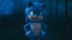 sonic the hedgehog is standing in the woods