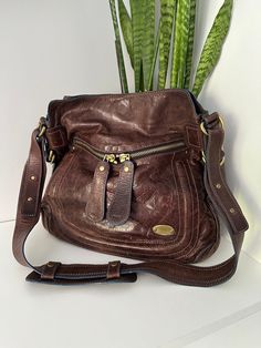 Please note, that this vintage item is pre-owned. Due to different screen properties, colors may slightly vary from the photo. If you have any other questions, please, don't hesitate to message me at any time. Brown Satchel Shoulder Bag With Brass Hardware, Vintage Brown Bag For Everyday Use, Vintage Brown Shoulder Bag For Everyday, Vintage Brown Shoulder Bag Satchel, Vintage Brown Shoulder Bag With Leather Backing, Retro Brown Shoulder Bag With Brass Hardware, Retro Brown Soft Leather Shoulder Bag, Retro Brown Vintage Bags, Brown Crossbody Shoulder Bag With Brass Hardware