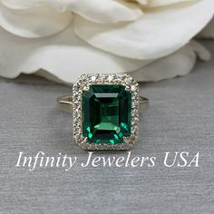 Emerald Engagement Ring, Emerald Green Engagement Ring, Moissanite Halo Engagement Ring, Anniversary Ring, 14k Yellow Gold #UniqueRings #PromiseRing #UniqueRing #BirthdayGift #GreenStone #MayBirthstone #MoissaniteRing #MothersDayGift #EmeraldHaloRing #EngagementRing Emerald Ring Design, Green Engagement Rings, Moissanite Engagement Ring Halo, Gold Halo, Emerald Engagement, Yellow Gold Setting, Ring Pictures, Mothersday Gifts, Dream Engagement Rings