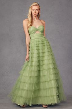 This dress is made with 100% polyester, ensuring quality and durability. The stunning neon pink and sage green colors are sure to make a statement, while the long A-line skirt adds elegance and sophistication. The sweetheart neckline and open back add a touch of glamor, making this the perfect choice for any formal occasion. Plus, the strapless design allows for effortless movement and comfort, so you can dance the night away without any restrictions. As a product expert, we guarantee this dress Ruffle Skirt Long, Special Ocassion Dresses, Ruffled Gown, Keyhole Dress, Tulle Ball Gown, Designer Prom Dresses, Prom Designs, Ruched Top, Ruffled Skirt