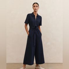 Size Model Is A Uk 8/Us 4, Wearing A Uk 8/Us 4 Model Height Is 5'9"/175cm Take Your Normal Size Shape Zip-Up Collar Short Sleeves Optional Belt Practical Pockets Wide Leg Crop-Pant Shape Chic Navy Jumpsuit For Work, Navy Jumpsuits And Rompers For Work In Summer, Jumpsuit Belt, Madewell Jumpsuit, Camo Jumpsuit, Ribbed Halter Top, Free People Jumpsuit, Cold Shoulder Jumpsuit, Flowy Jumpsuit