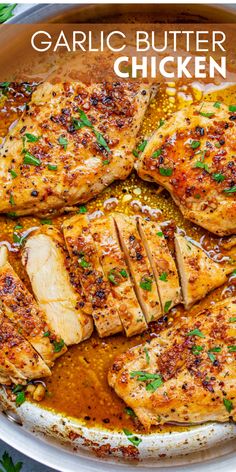 garlic butter chicken in a pan with sauce and parsley