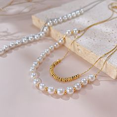 ✦ For a timeless and elegant look in your jewelry, try this Dainty Pearl Beads Layering Chain Necklace. Pairing double-layered pearls with delicate beads, this necklace is perfect for everyday wear and is resistant to tarnishing. Receive daily compliments with this minimal and refined necklace. ----------- DETAILS ----------- - Color: Gold/ Silver - Chain Length: 36.5cm + 6cm - Materials: Gold Plated, 316L Stainless Steel, Faux Pearl *316L Stainless Steel is hypoallergenic, generally safe for sensitive skin. - SKU: GX2309