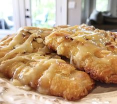 some kind of pastry on a plate sitting on a table