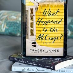 the book what happened to the mccray? is sitting on top of some books