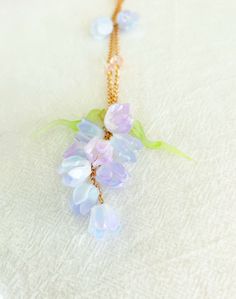 Elevate your style with our exquisite Handmade Shrink Plastic Crocus Necklace, a wearable work of art capturing the essence of delicate blooms. Crafted with meticulous attention to detail, each pendant showcases the vibrant hues of crocus petals, making it a perfect accessory for nature enthusiasts and flower lovers alike. The lightweight and durable shrink plastic material ensure comfortable wear, while the intricate design adds a touch of whimsy to any outfit. This unique floral necklace is a testament to craftsmanship and creativity, making it an ideal gift for those who appreciate handmade, nature-inspired jewelry. Embrace the beauty of spring all year round with this stunning crocus necklace - a truly distinctive piece for your jewelry collection! Crocus Flower, Shrink Plastic, Floral Pendant, Nature Inspired Jewelry, Floral Necklace, Wedding Jewellery Necklace, Flower Lover, Intricate Design, Plastic Material