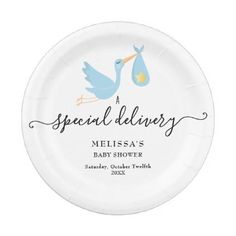 a paper plate with a stork holding a baby's bottle and the words special