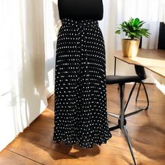 Step Into The Timeless Elegance Of This Mittoshop Pleated Midi Skirt. The Playful Polka Dots Dance Across A Flowing Black Fabric, Creating A Chic Silhouette Perfect For Expressing Your Unique Style. Pleated Design Button-Down Front Polka Dot Pattern Size L Midi Length Made In China New With Tags Size: Womens L Condition: New With Tags Chic Long Skirt With Polka Dot, Chic Polka Dot Long Skirt, Chic Polka Dot Midi Skirt, Elegant Polka Dot Flowy Skirt Bottoms, Polka Dot Lined Skirt Bottoms For Day Out, Polka Dot Lined Skirt For Day Out, Black And White Skirt, Polka Dot Skirt, Pleated Midi Skirt