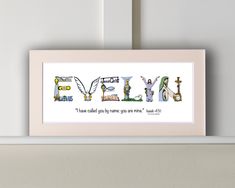 a white shelf holding a framed print with the word fly written in different colors and letters