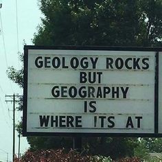 a sign that reads, geolocy rocks but geography is where it's at