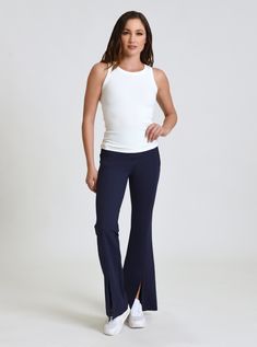 FEATURES & BENEFITS Elevate your wardrobe with our Cara Split Hem Pant! Featuring zipper side pockets and a front hem split, these pants provide both functionality and style. With a 32" inseam and high rise fit, they offer ultimate comfort and a flattering silhouette. Upgrade your look today! Zipper Side Pockets Front Hem Split Inseam: 32" High Rise FABRIC CONTENTS Self: 68% Viscose 28% Nylon 4% Spandex Model is wearing size small Chic Long Pants With Side Slits, Workwear Trousers With Side Slits, Chic Full-length Bottoms With Side Slits, Chic Full Length Bottoms With Side Slits, Chic Full-length Pants With Side Slits, Chic Full Length Pants With Side Slits, Fitted Wide Leg Trousers With Side Slits, Chic Straight Leg Pants With Side Slits, Stretch Full-length Bottoms With Side Slits