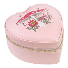 a pink heart shaped box with an image of a bird and flowers on the inside