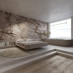 a bed sitting on top of a wooden floor next to a window in a bedroom