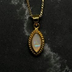 Let The Sun Shine. Type - White Location - Coober Pedy, Australia Size - 10mm X 5mm X 3mm Weight - 0.65 Cts Cut - Marquise Pattern - Rolling Flash Brightness - B3 Metal - 18k Gold Filled Chain - 1mm 18” Box Chain Full Video: Https://Www.Theopalsource.Com/Product-Page/Australian-Coober-Pedy-Marquise-Cut-Opal-Set-In-18k-Gold Coober Pedy Australia, Sun Shine, Coober Pedy, Marquise Cut, Gold Filled Chain, Box Chain, Product Page, Womens Jewelry Necklace, Gold Filled