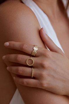 Inspiration : The Hector ring in the shape of endless circles celebrates all of creation and everything around us. 24K sustainable gold plated ring (gilding : satin) Sizing : adjustable (from size 50 to 58) Water-resistant No risk of allergy (nickel-free, lead-free) Sustainable gold plated (gilding : satin) Ethically made in France Delivered in an ecological pouch and box #of #Timeless #World #Fashion #The #The #Jewelry #StatementJewelry #in #Elegance #Gold Ring Photoshoot, Jewelry Shoot, Icon Jewelry, Photographing Jewelry, Ring Photography