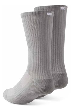 Targeted cushioning and ribbed arch support put comfort under every step in breathable cotton-blend socks knit with a snug, stay-in-place fit. Pack of three pairs Cotton/polyester/rubber/spandex/other fibers Machine wash, tumble dry Imported Pair Of Thieves, White Out, Arch Support, Knitting Socks, Crew Socks, Nordstrom Rack, Arch, Light Blue, Cotton Blend