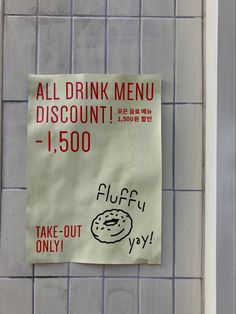 a sign posted on the side of a building stating that all drink menu is discount