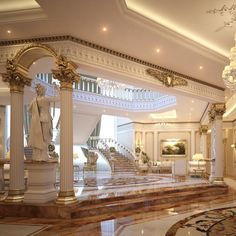 a large foyer with marble floors and stairs