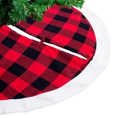 a red and black plaid christmas tree skirt