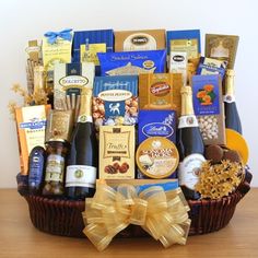 a wine and gourmet gift basket is shown