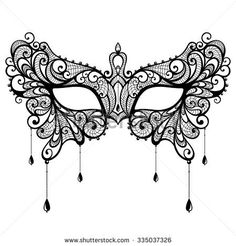 a masquerade mask with ornate ornaments