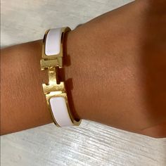 This Is The Clic H Bracelet By Herms. It Is A Narrow Bracelet In Enamel With Gold Plated Hardware Perfect For An Everyday Outfit. White Hermes Bracelet, Hermes Bracelet White, H Bracelet, Hermes Bracelet, Hermes Jewelry, Everyday Outfit, Womens Jewelry Bracelets, Everyday Outfits, Gold Plate