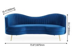 a blue couch sitting on top of a white floor next to a ruler and measurements