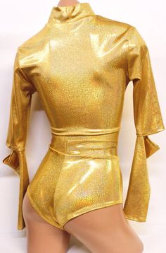 Check out our robot love with a set for our favorite android! Our Golden Space Droid set has a Long Sleeve Keyhole Crop Top in gold hologram with cut outs on the elbows for a futuristic look. The bottoms super cheeky with a lining in the front panel. Made of 4 way stretch lycra.ALL HANDMADE IN USA Items will ship within 2-4 business days. Sugarpuss Size Chart + Care Instructions Shipping Policies Gold Fitted Bottoms For Club, Gold Fitted Bottoms For Club Wear, Fitted Gold Bottoms For Club Wear, Fitted Shiny Gold Bottoms, Metallic Rave Bottoms For Party, Metallic Rave Party Bottoms, Pin Up Costume, Hoodie Costume, Cheeky Shorts