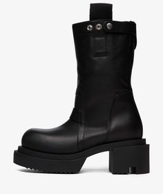 Rick Owens, a fashion brand known for its dark and edgy aesthetic, was founded in California in 1994. The brand focuses on creating avant-garde pieces that challenge traditional fashion norms.Introducing the Pull On Bogun Boots from Rick Owens's Fall/Winter 2024 collection. These luxurious and stylish black boots are perfect for making a statement in the colder months. Elevate your look with these high-quality designer boots, available now at SVD. Rick Owens Boots, The Rick, Edgy Aesthetic, Boot Pulls, Fashion Enthusiast, Fall Winter 2024, Stylish Boots, Traditional Fashion, Bank Card