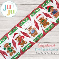 the gingerbread christmas table runner is on display in front of a white wooden background