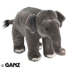 an elephant stuffed animal is shown on a white background with the head turned to look like it's walking