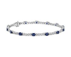 This sapphire and diamond bracelet combines classic tennis bracelet style with a colorful blue hue. Deep blue oval-cut sapphires alternate with round-brilliant cut diamonds in an alternating pattern that adds eye-catching interest to this jewelry box essential. Top Engagement Rings, Couple Wedding Rings, White Gold Bracelet, Jewelry Wedding Rings, Bracelet Style, Wedding Ring Designs, Diamond Shop, Engagement Ring Styles, Shop Engagement Rings