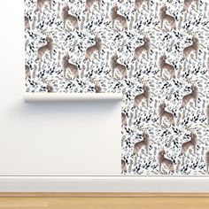 the wall paper has deers on it