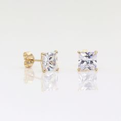 14k Simulated Diamond Earring | 5.0MM Cubic Zirconia Push Back Earring | Real Yellow Gold Earring | Square Stud Earring | Birthday Gift P R O D U C T 𝄪 D E T A I L S ✽ FINAL SALE - NO RETURN ACCEPTED ✽ ✽ Metal: 14k Yellow Gold ✽ Needle Length: 9.3 mm ✽ Stone: Stone: 5.0 mm Cubic Zirconia (as single) ✽ Made to Order O T H E R 𝄪 I N F O R M A T I O N ▪ All items are custom made to order.  ▪ Rush order: Please contact us before place your order to ensure that we can accommodate your deadline ▪ Al Classic Diamond White Tarnish Resistant Earrings, Gold Plated Brilliant Cut Earrings For Gift, Classic Diamond White Tarnish-resistant Earrings, Gold Plated Earrings With Brilliant Cut For Gift, Classic Cubic Zirconia Diamond Earrings, Gold Diamond Earrings With Vs Clarity For Anniversary, Diamond Earring, Square Earrings Studs, Square Stud